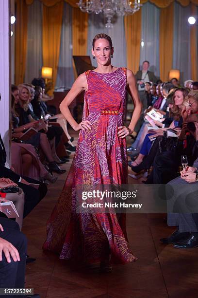 Models attends a catwalk show and auction hosted by Browns, Harpers Bazaar and H.E. Alain Giorgio Maria Economides in aid of Women for Women...