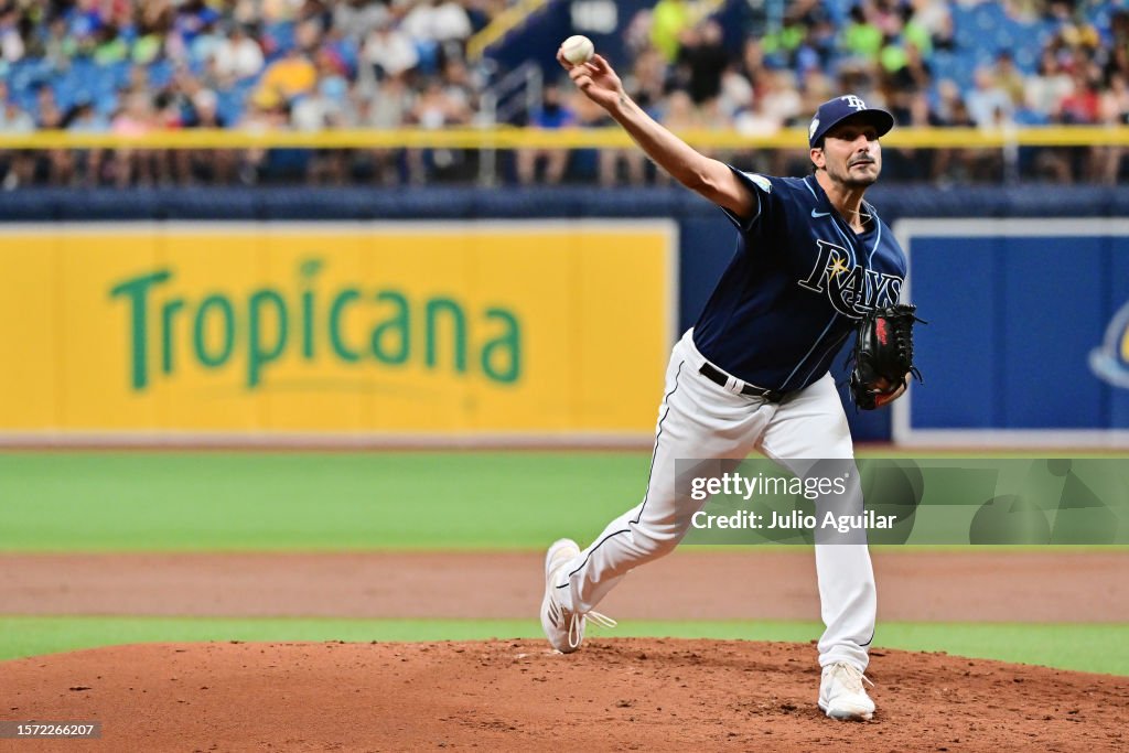 Miami Rays Zach Eflin of the Tampa Bay Rays delivers a pitch to the Miami... News ...