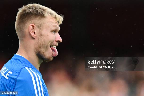 Arsenal's English goalkeeper Aaron Ramsdale reacts during the pre-season friendly football match for the Emirates Cup final between Arsenal and...