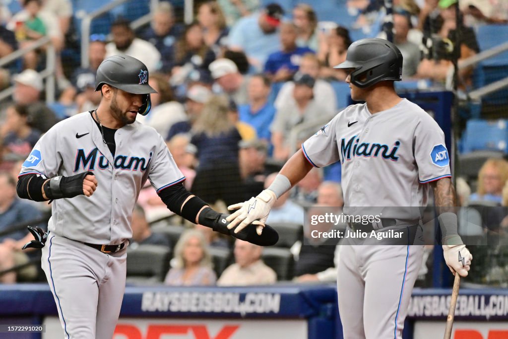 Miami Rays Yuli Gurriel celebrates with Dane Myers of the Miami Marlins after ...