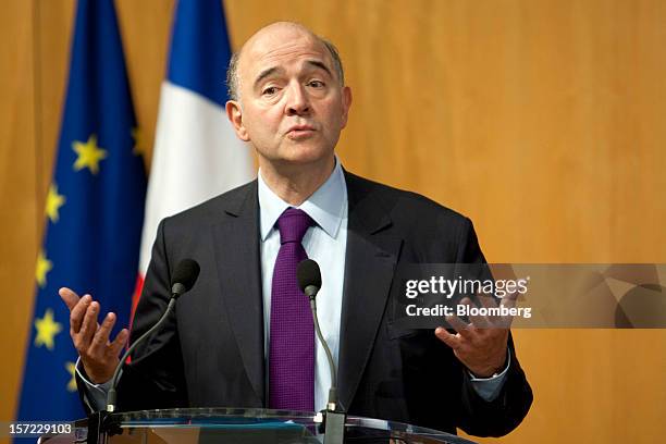 Pierre Moscovici, France's finance minister, speaks during a financial conference at the Ministry of Economy, Finance and Industry in Paris, France,...