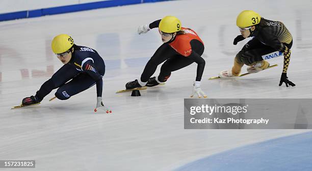Sayuri Shimizu of Japan chases Seung-Hi Park of Korea and Marianne St-Gelais of Canada in Race 5 of Ladies 500m Heats during day one of the ISU World...