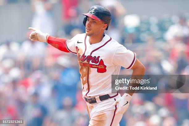 Matt Olson of the Atlanta Braves reacts after hitting a home run during the fourth inning against the Los Angeles Angels at Truist Park on August 2,...