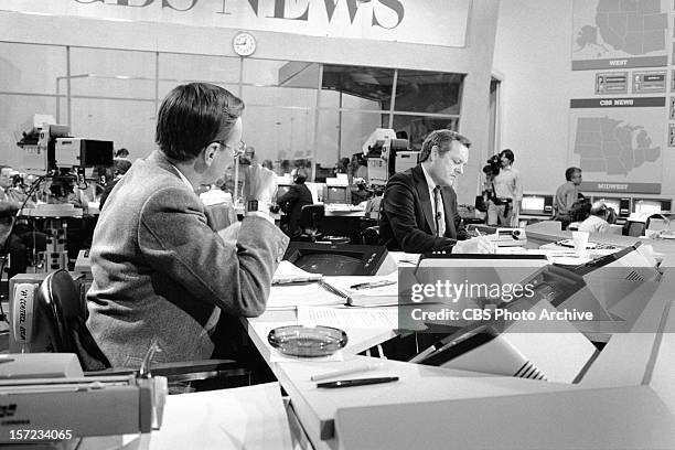 News correspondents Bruce Morton and Bob Schieffer preparing for general election night coverage at the CBS Broadcast Center, New York. Image dated...