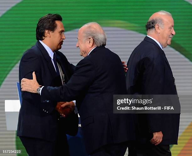 President, Joseph S.Blatter greets the Tahiti coach, Eddy Etaeta in the draw hall during a photocall prior to the Official Draw for the FIFA...