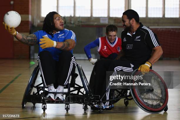 Ma'a Nonu and Piri Weepu of the All Blacks take part in a wheelchair rugby match at the Harrow Club on November 30, 2012 in London, England.