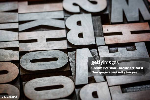 Wood type waits to be used at Spindletop Design and Workhorse Printmakers, Wednesday, Aug. 28 in Houston. Jennifer Blanco, John Earles and Joe Ross,...