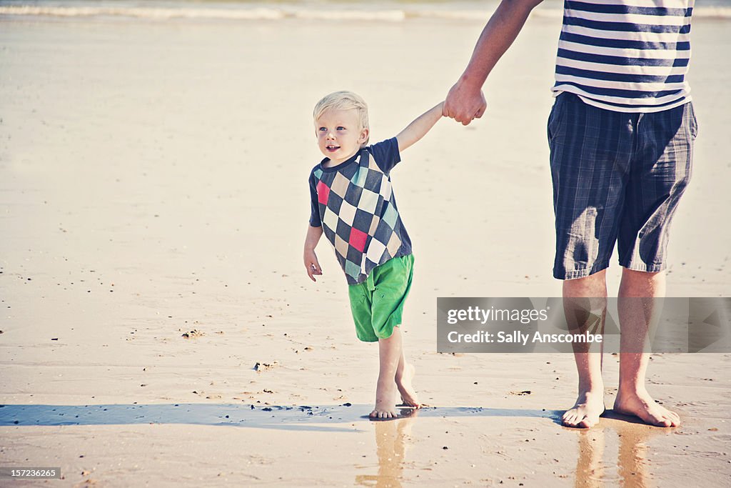 Father and son on the beach