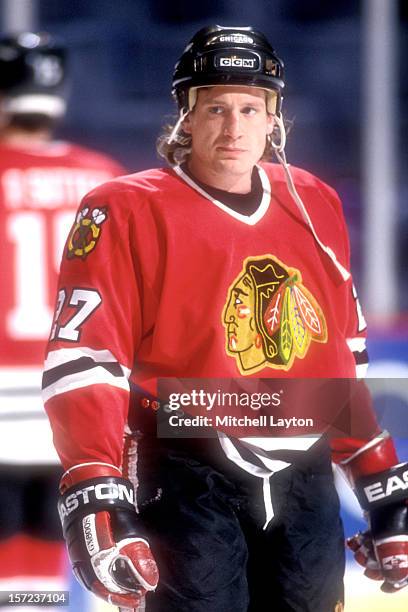 Jeremy Roenick of the Chicago Black Hawks looks on before a hockey game against the Washington Capitals on March 8, 1994 at USAir Arena in Landover,...