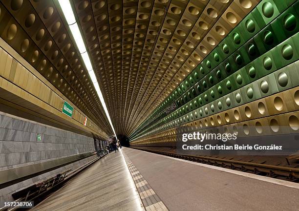 subway station with green and golden tiles - christian beirle gonzález stock pictures, royalty-free photos & images