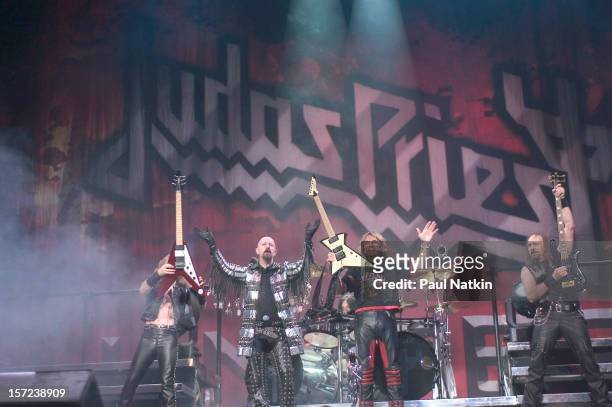 British heavy metal group Judas Priest perform onstage at the Tweeter Center, Chicago, Illinois, August 21, 2004. Pictured are, from left, guitarist...