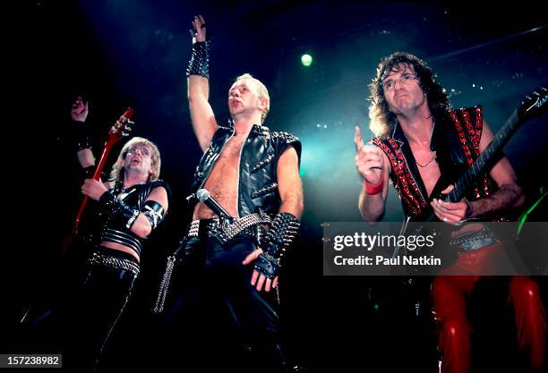 British heavy metal group Judas Priest perform onstage at the Rosemont Horizon, Rosemont, Illinois, June 14, 1984. Pictured are, from left, guitarist...