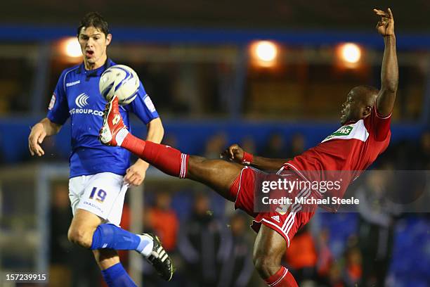 Andre Bikey of Middlesbrugh clears from Nikola Zigic of Birmingham City during the npower Championship match between Birmingham City and...