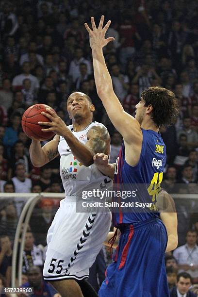 Curtis Jerrels of Besiktas JK Istanbul competes with Ante Tomic of FC Barcelona Regal during the 2012-2013 Turkish Airlines Euroleague Regular Season...