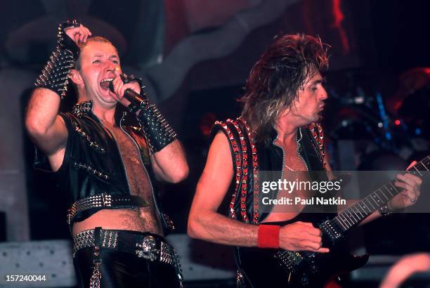 British heavy metal group Judas Priest perform onstage at the Rosemont Horizon, Rosemont, Illinois, June 14, 1984. Pictured are singer Rob Halford...