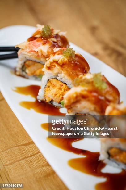 Crawfish, avocado, tempura flakes, snow crab, spicy tuna, wasabi tobiko and eel sauce, at the Fish & the Knife restaurant, Tuesday, March 18 in...
