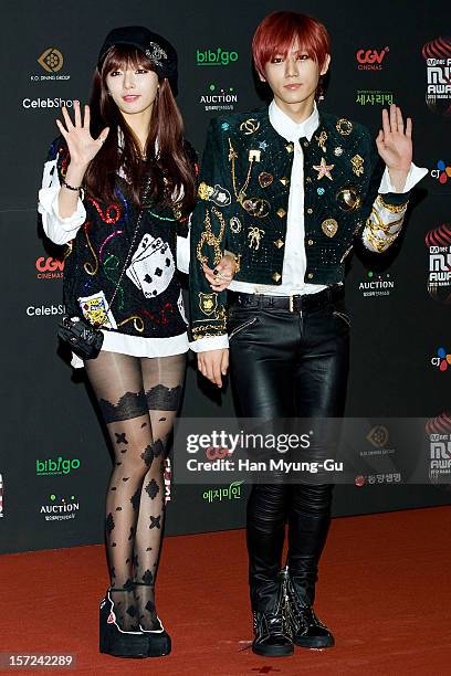 Hyuna of South Korean girl group 4minute and Hyunseung of South Korean boy band Beast attend during the 2012 Mnet Asian Music Awards Red Carpet on...