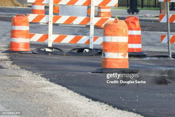 blocked road for asphalt replacement - lane closed sign stock pictures, royalty-free photos & images