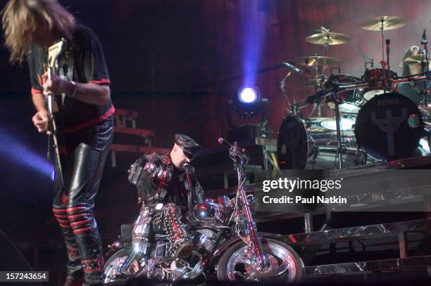 British heavy metal group Judas Priest perform onstage at the Tweeter Center, Chicago, Illinois, August 21, 2004. Pictured are guitarist Glenn Tipton...