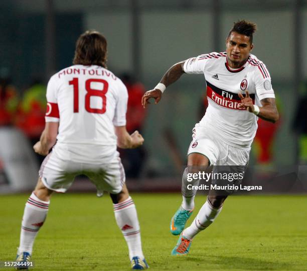 Kevin Prince Boateng of Milan celebrates with Riccardo Montolivo after scoring their second goal during the Serie A match between Calcio Catania and...