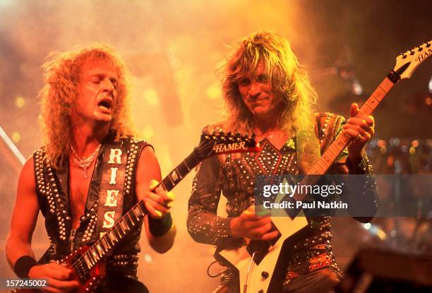 British heavy metal group Judas Priest perform onstage, 1986. Pictured are guitarists KK Downing and Glenn Tipton.