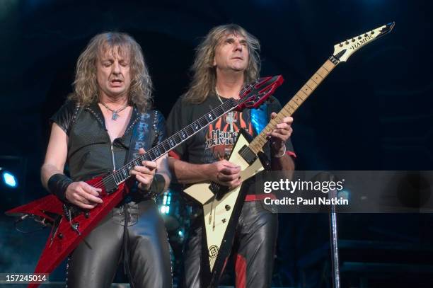 British heavy metal group Judas Priest perform onstage at Alpine Valley, East Troy, Wisconsin, August 14, 2004. Pictured are guitarists KK Downing...