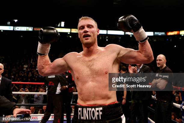 Andrew Flintoff celebrates after victory in his International Heavyweight bout with Richard Dawson at MEN Arena on November 30, 2012 in Manchester,...