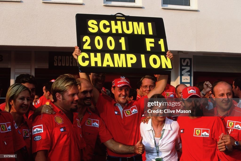 19 Aug 2001:  Ferrari driver Michael Schumacher celebrates after the Formula One Hungarian Grand Pri
