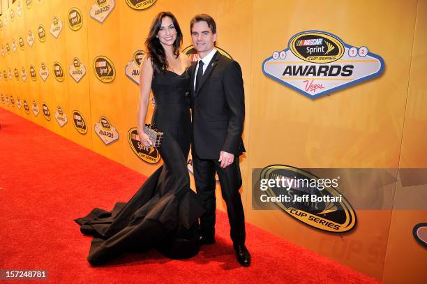 Jeff Gordon, driver of the DuPont Chevrolet, and his wife Ingrid Vandebosch arrive on the red carpet for the NASCAR Sprint Cup Series Champion's...