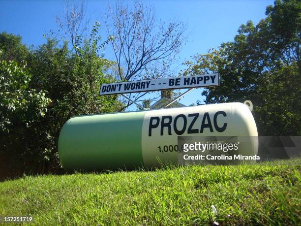 Prozac gas tank art stands on a hill in Red Hook, New York.