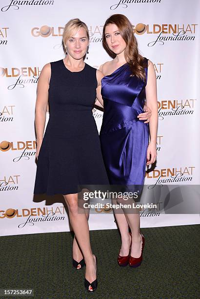 Actress Kate Winslet and singer Hayley Westenra attend the American Christmas Carol Concert benefiting the Golden Hat Foundation at Carnegie Hall on...
