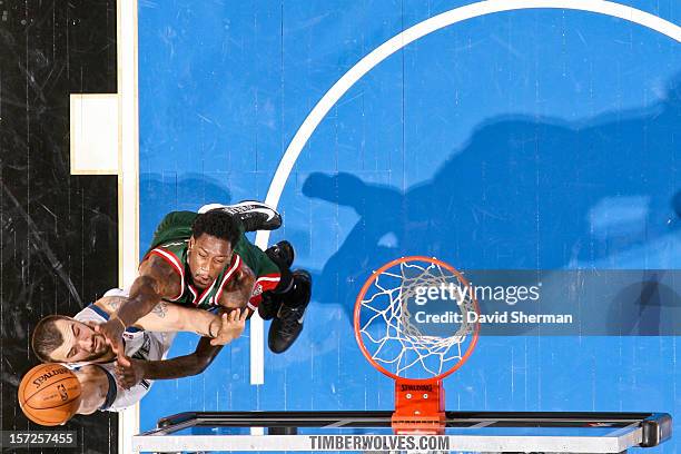 Nikola Pekovic of the Minnesota Timberwolves shoots against Larry Sanders of the Milwaukee Bucks on November 30, 2012 at Target Center in...