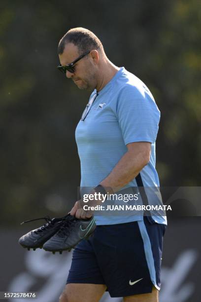 Argentina's Los Pumas head coach Michael Cheika arrives for a training session in Ingeniero Maschwitz, Buenos Aires province, on August 2 ahead of a...