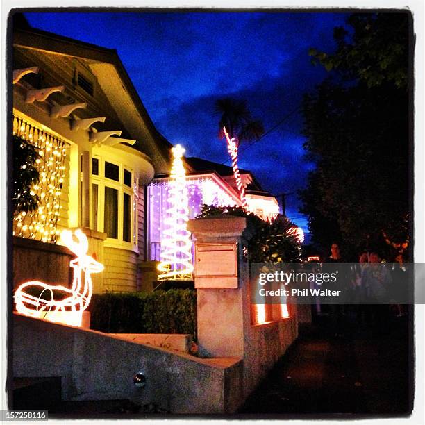 Christmas lights decorate Franklin Road houses and businesses in Ponsonby on December 1, 2012 in Auckland, New Zealand. Every year in December the...