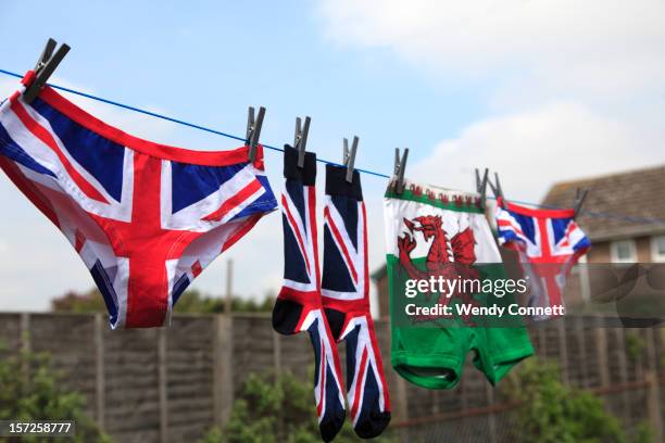 welsh dragon union jack knickers laundry - welsh flag stock pictures, royalty-free photos & images