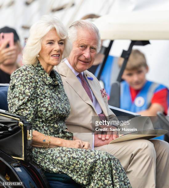 King Charles III and Queen Camilla visit Sandringham Flower Show at Sandringham House on July 26, 2023 in King's Lynn, England.