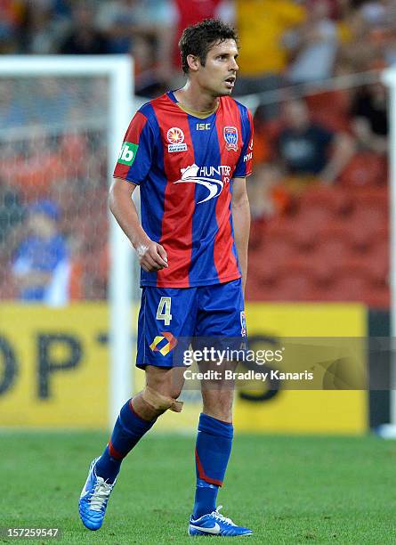 Josh Mitchell of the Jets is sent from the field after an incident with Thomas Broich of the Roar during the round nine A-League match between the...