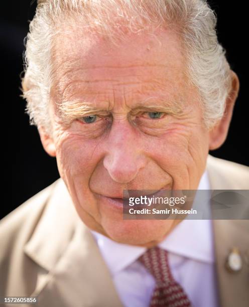 King Charles III visits Sandringham Flower Show at Sandringham House on July 26, 2023 in King's Lynn, England.
