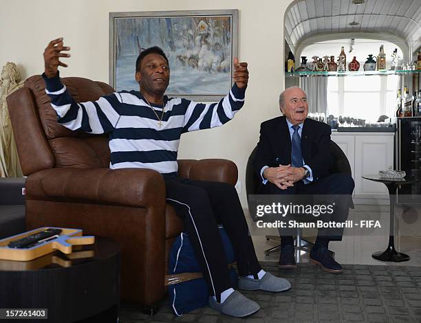 President, Joseph S. Blatter pays a courtesy visit to Brazilian football legend Pele at his home prior to the Official Draw for the FIFA...