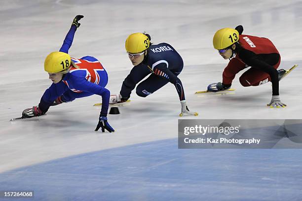 Elise Christie of Great Britain leads Race 1 of Ladies 1000m Semifinals ahead of Min-Jung Kim of Korea and Jianrou Li of China during day two of the...