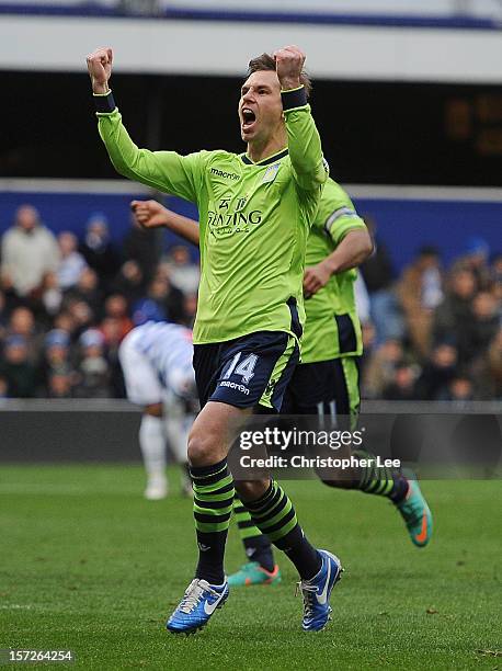 Brett Holman of Aston Villa celebrates scoring the opening goal during the Barclays Premier League match between Queens Park Rangers and Aston Villa...