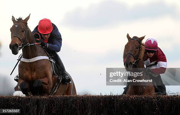 Barry Geraghty riding Bobs Worth clear the last to win The Hennessy Gold Cup Steeple Chase at Newbury racecourse on December 01, 2012 in Newbury,...
