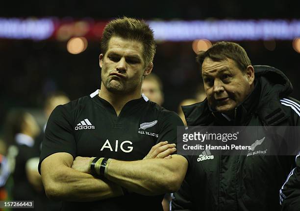 Richie McCaw of New Zealand and Steve Hansen head coach of New Zealand lookm on after defeat during the QBE International match between England and...