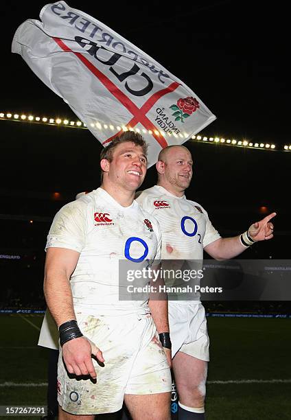 Tom Youngs and Dan Cole of England celebrate victory during the QBE International match between England and New Zealand at Twickenham Stadium on...