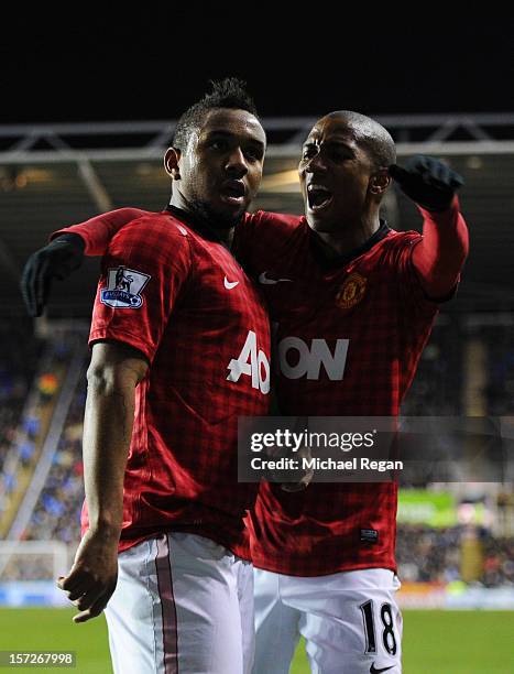 Anderson of Manchester United celebrates scoring a goal with teammate Ashley Young during the Barclays Premier League match between Reading and...