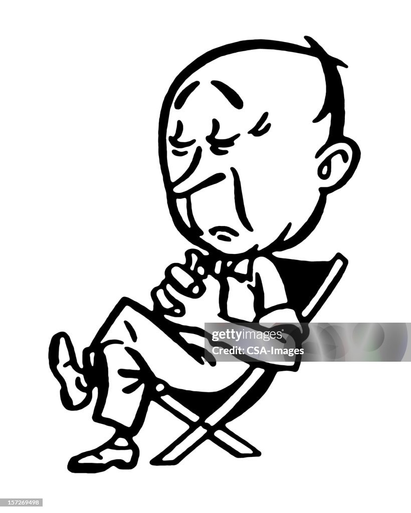 Man Sitting in Chair