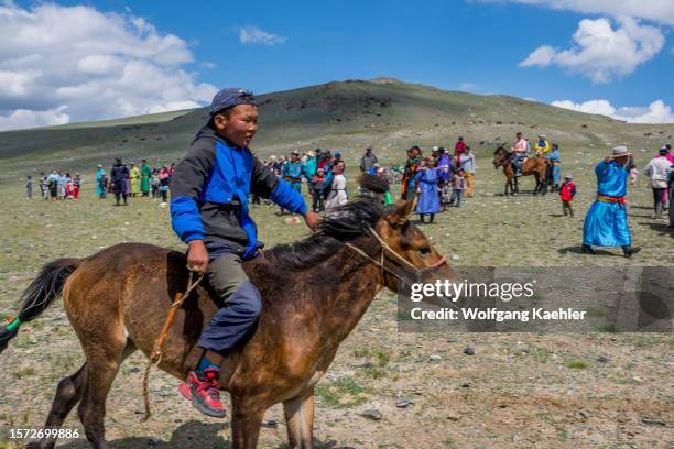 The horse racing event at a local Naadam Festival in the Sagsai River valley, a remote valley in the Altai Mountains near Altai Sum about 200...