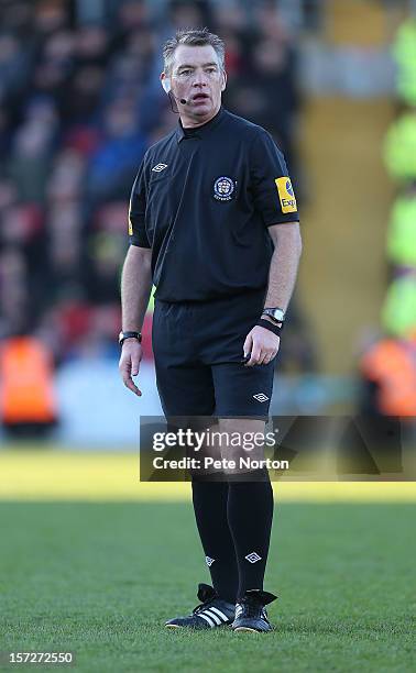 Referee Mark Haywood in action during the FA Cup with Budweiser Second Round match at Sincil Bank Stadium on December 1, 2012 in Lincoln, England.