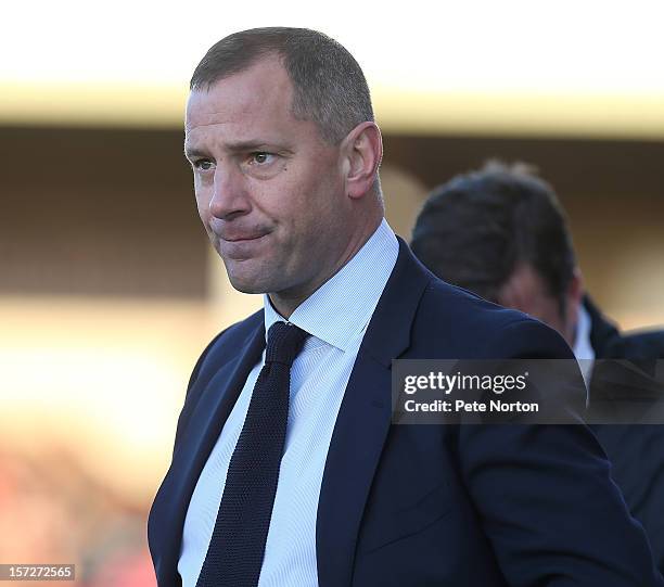 Lincoln City manager David Holdsworth looks on during the FA Cup with Budweiser Second Round match at Sincil Bank Stadium on December 1, 2012 in...