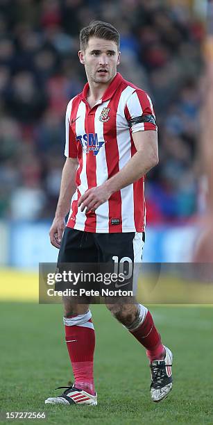 Jamie Taylor of Lincoln City in action during the FA Cup with Budweiser Second Round match at Sincil Bank Stadium on December 1, 2012 in Lincoln,...